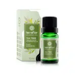 Frasco do óleo essencial de tea tree com embalagem ao lado.