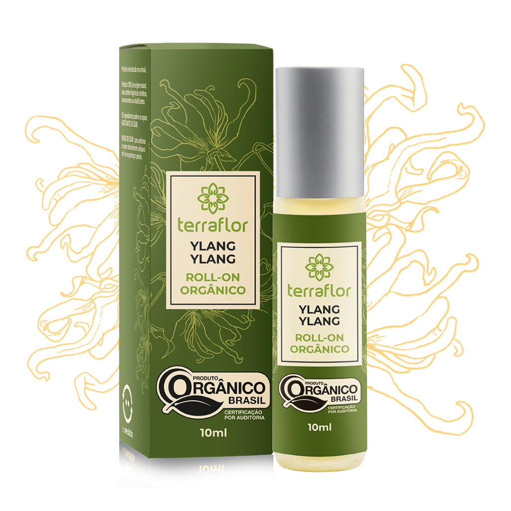 Frasco e embalagem do roll-on orgânico de ylang ylang com ilustrações ao fundo.